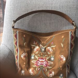 Johnny was embroidered leather handbag